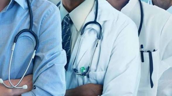 Three healthcare professionals