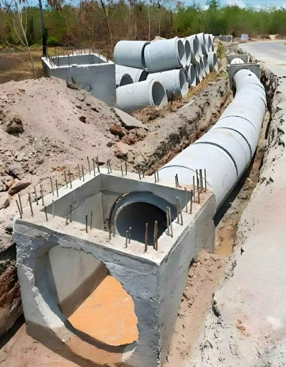 Underground drainage system installation with concrete pipes