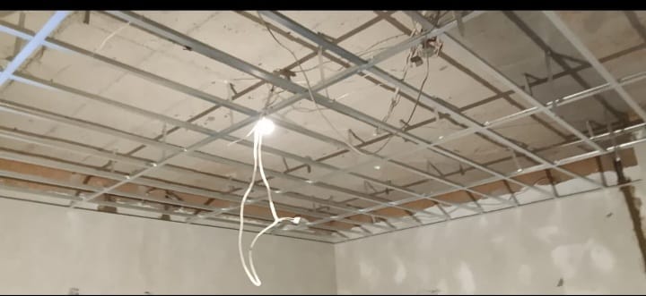 Suspended electrical wire in unfinished interior space