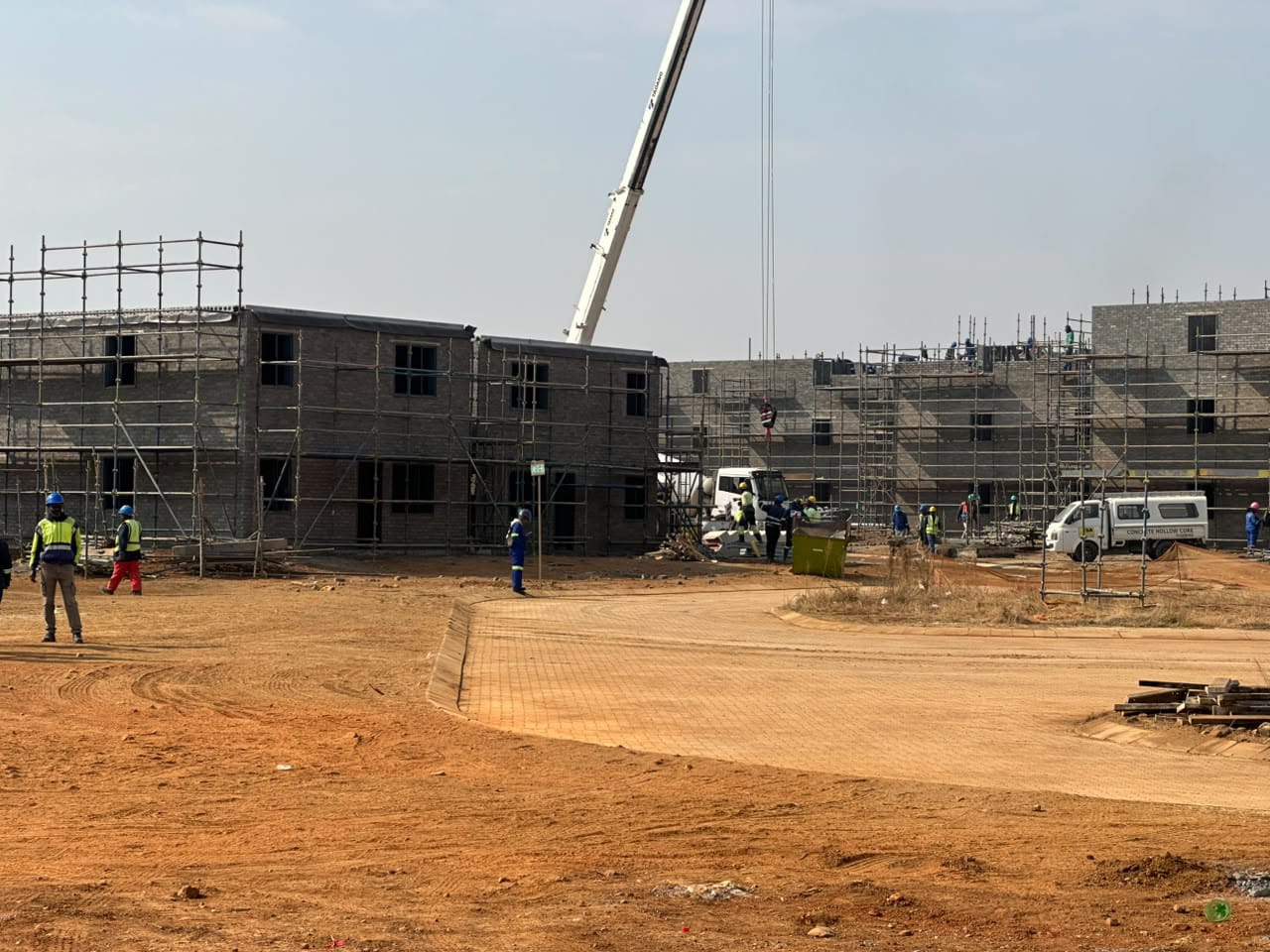 Large residential construction site with multiple buildings