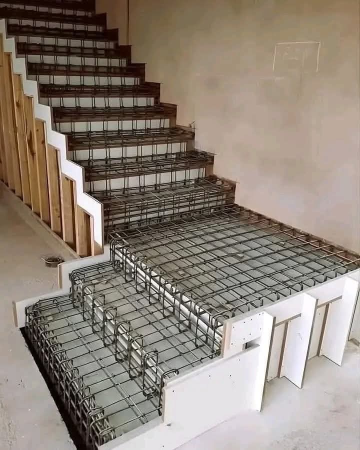 Staircase under construction with exposed steel reinforcement