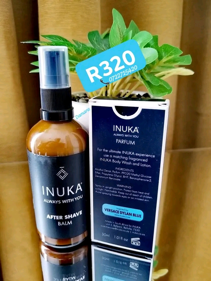 INUKA after shave balm and parfum box on gold background