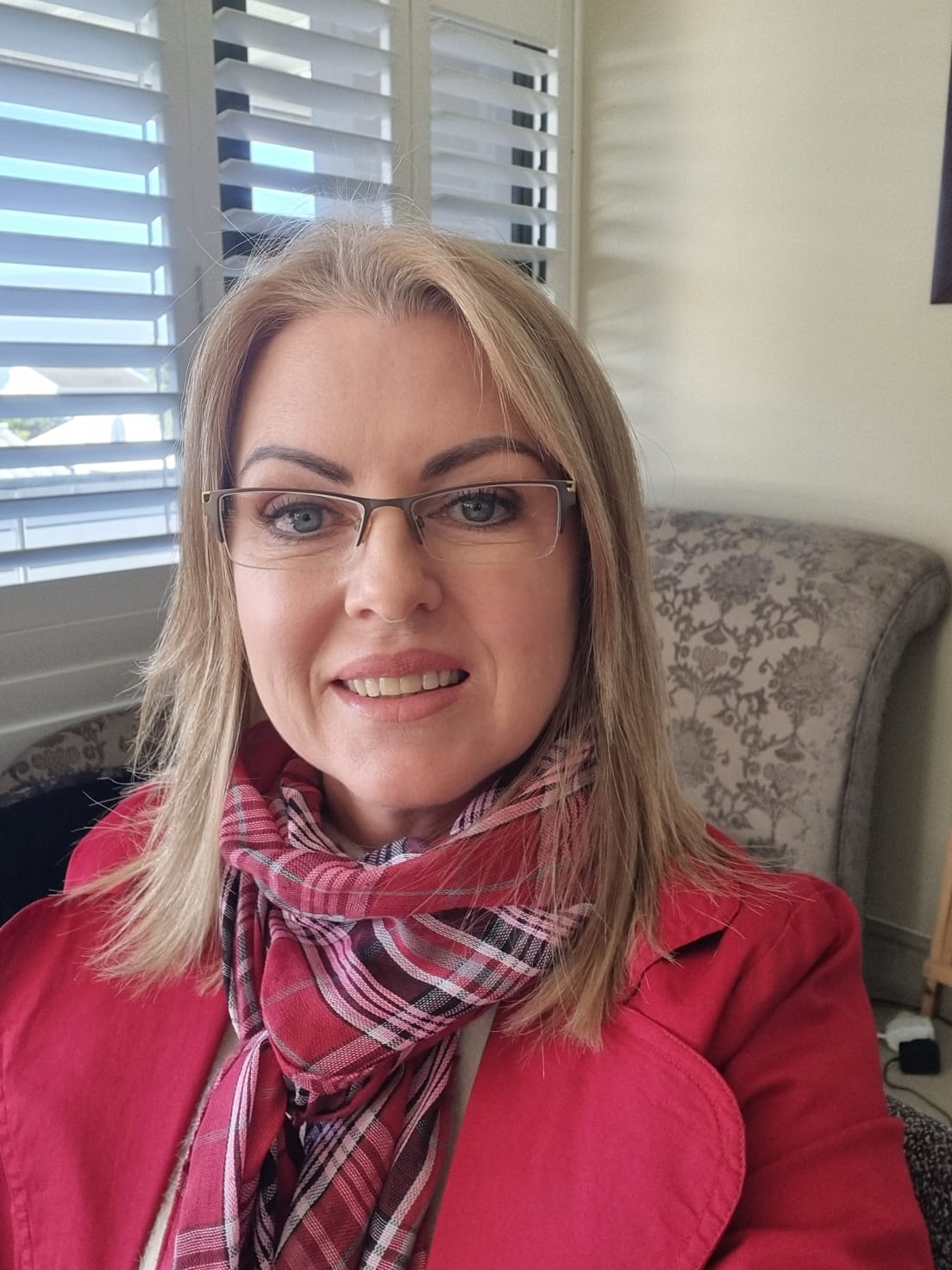 Dr Louise van Coller smiling warmly