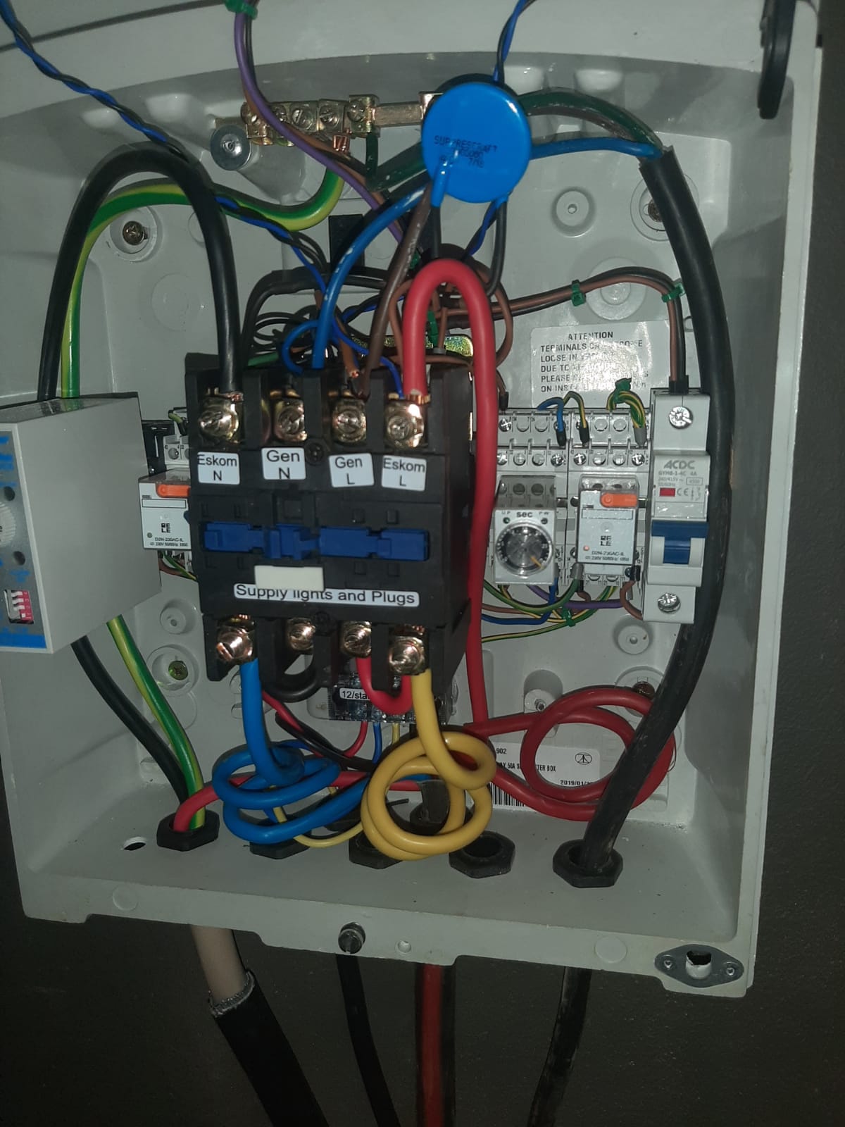 Distribution board with wiring and circuit breakers for generator and Eskom connections