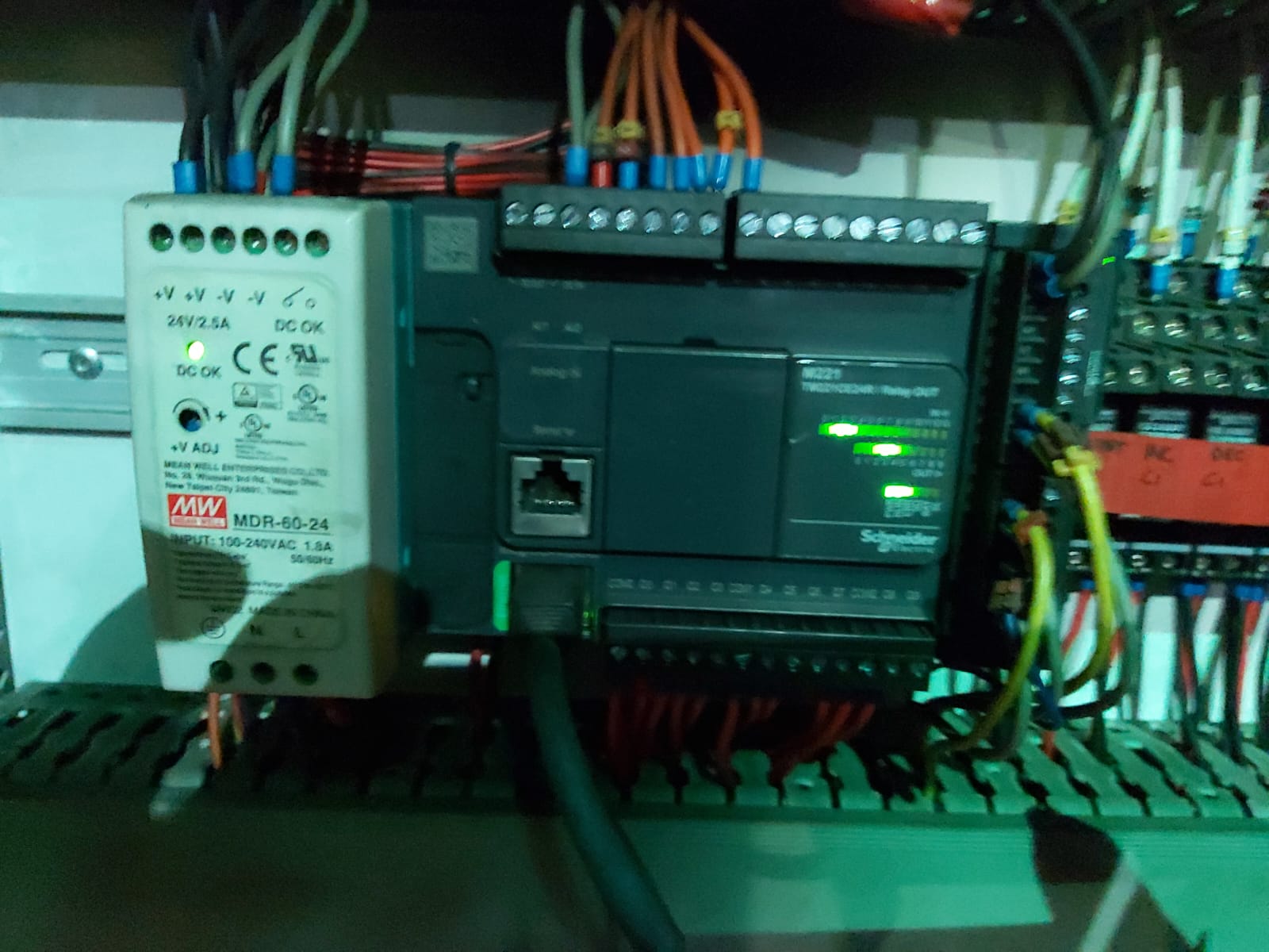 Industrial control panel with Mean Well power supply and PLC modules