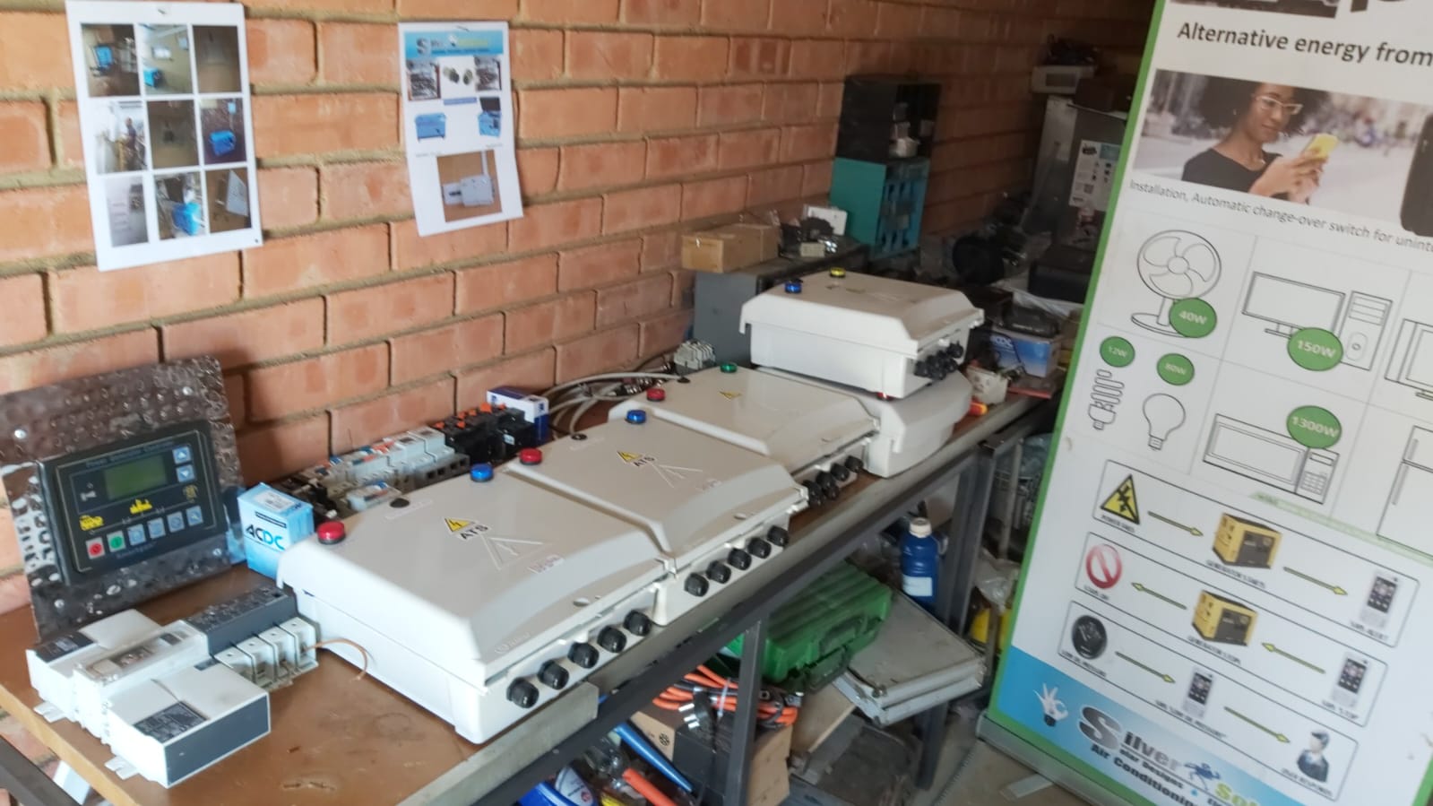Workbench with solar panel prototypes and electronic components