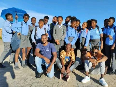 School group outing on beach